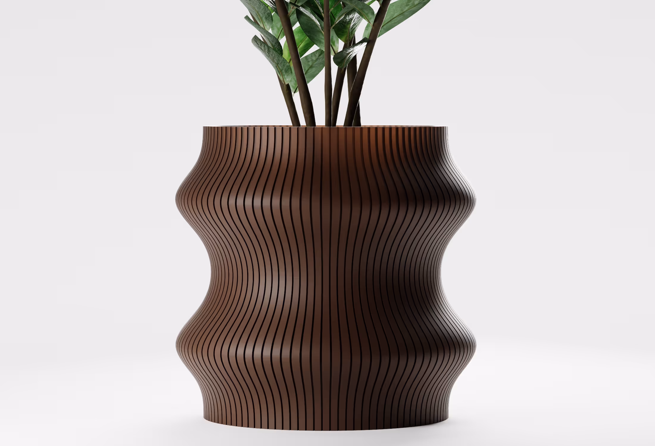 Dark Brown tall wavy planter with vertical ribbed texture, shown front-on with a leafy indoor plant against a light grey background.
