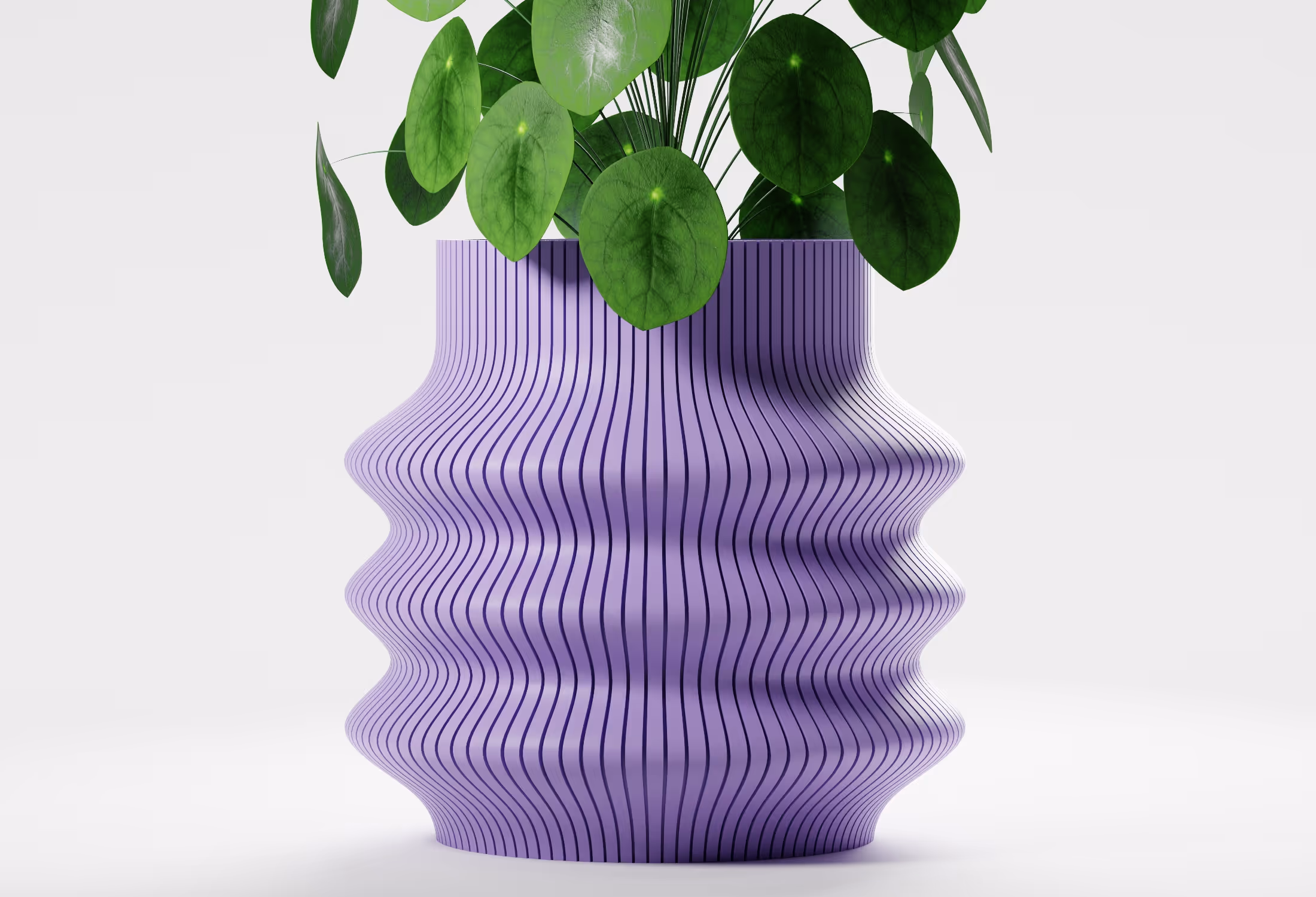 Lilac tall wavy planter with flowing vertical ribbed detailing and a sculptural silhouette, shown front-on with a round-leaf indoor plant against a light grey background.
