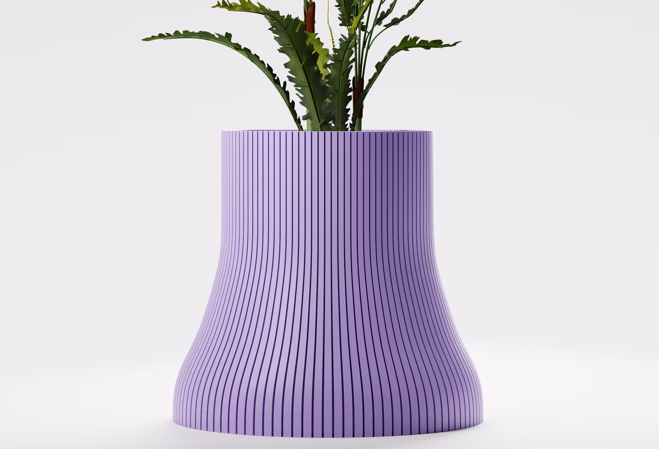 Purple vase with vertical black stripes holding green leafy plant on a white background.